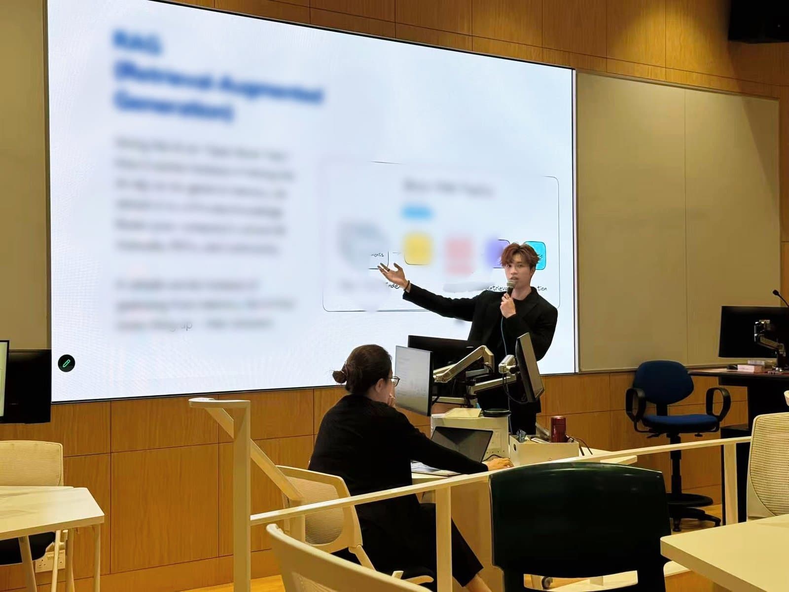 Guest lecture in front of a large screen